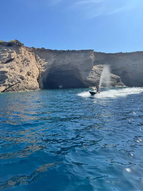 Ibiza: Cala Bassa Guided Jet Ski Tour - Experience Length, Group Size, and Language Support
