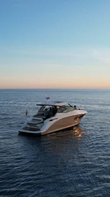 Ibiza Es Vedra: Private boat trip - Sunset and drinks. - Customizing your experience: paddle surf and swimming