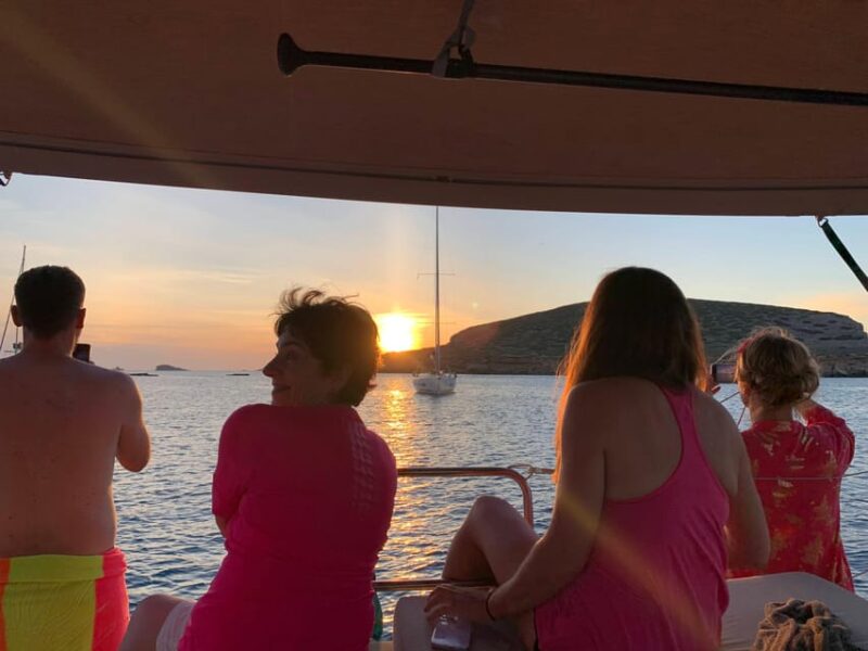 Ibiza: Sunset Sailing Tour with Wine - Sunset Over Ibiza’s Cliffs and Seaside