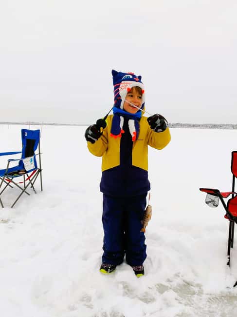 Ice Fishing Adventure in Levi with Salmon Soup - Relaxing by a Campfire with Salmon Soup and Hot Drinks