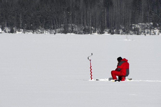 Ice Fishing and Husky - Exploring the Arctic Wilderness on the Snow-Covered Lake
