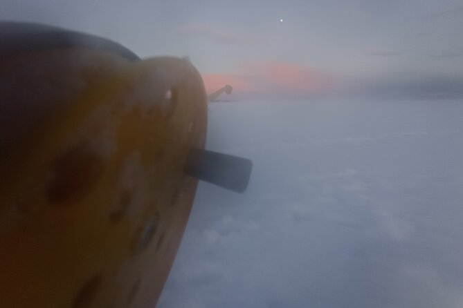 Ice fishing experience with Backpacker Helsinki Tour - Traditional Finnish Food and Drink Around the Fire