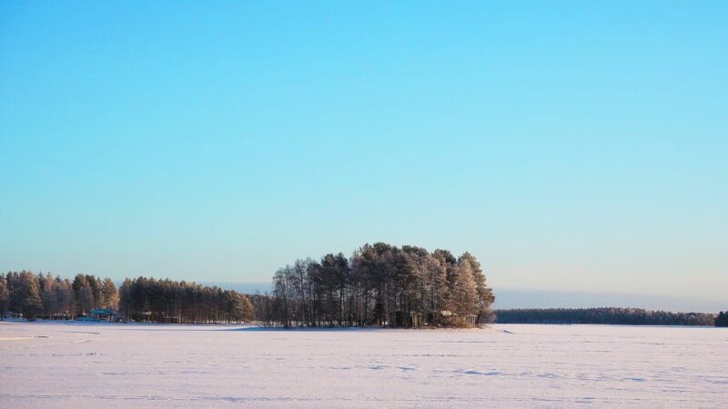 Ice fishing program in Lapland - Cozy Moments Around an Open Fire
