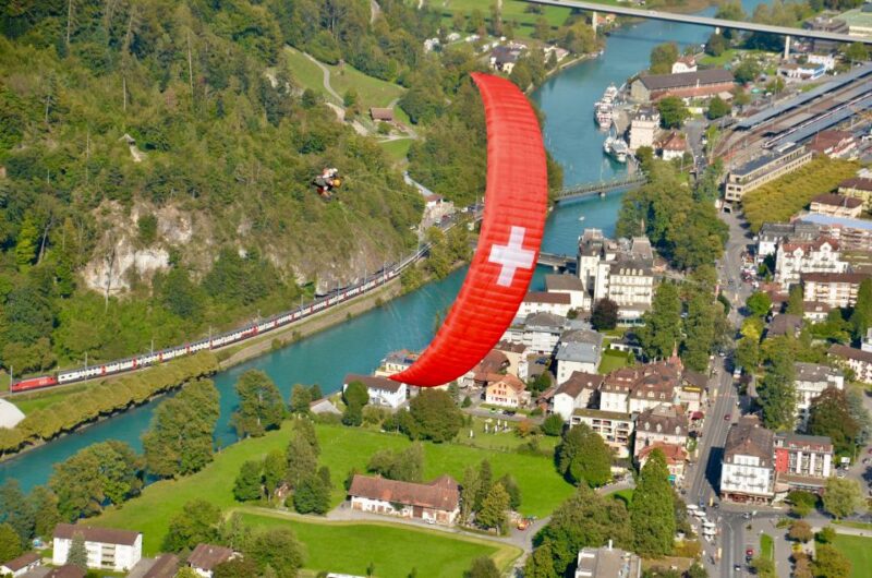 Interlaken: Paragliding Tandem High Flight - Practical Details: Transfers, Equipment, and Guides