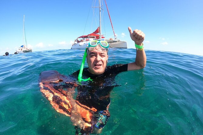 Isla Mujeres Catamaran Party Cruise with Snorkeling and Lunch - Key Points