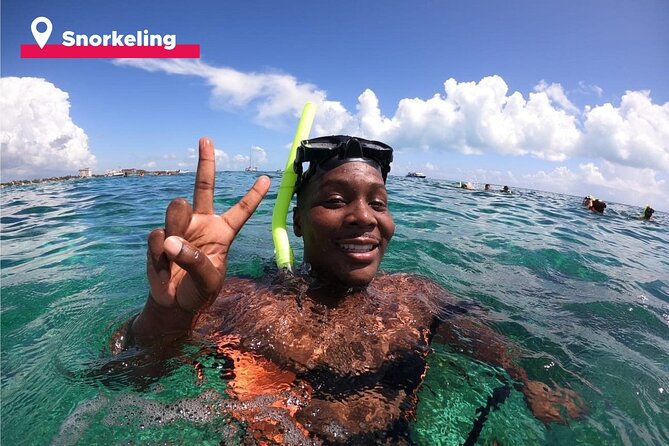 Isla Mujeres Catamaran + Snorkel + Open Bar on board + Buffet - The Experience on Board: Food, Drinks, and Entertainment