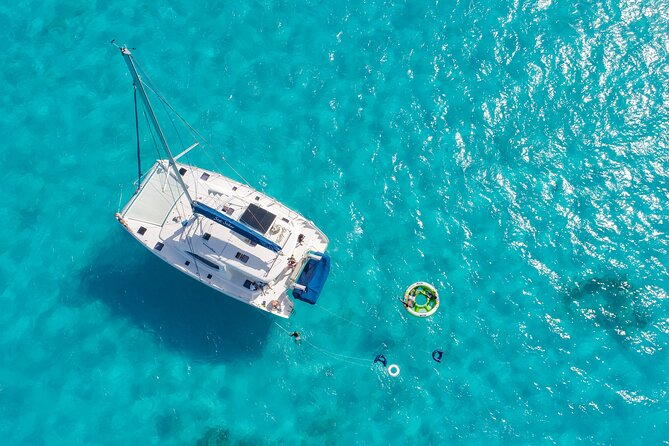 Isla Mujeres Full-Day Catamaran Tour  Buffet, Open Bar & Pickup - Practical Details and Considerations