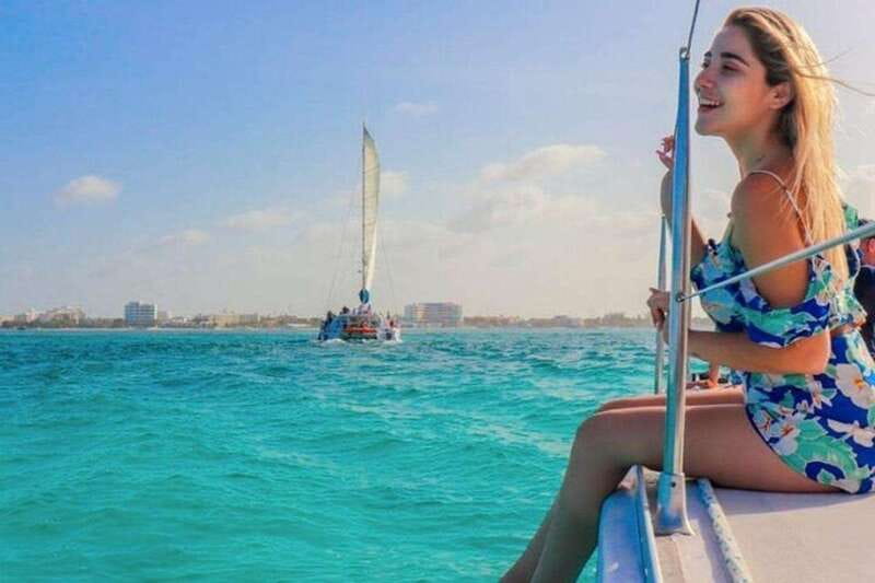 Isla Mujeres Plus Experience Catamaran Tour + Snorkel+Lunch - Sunset Sailing and the "Spinnaker" Experience