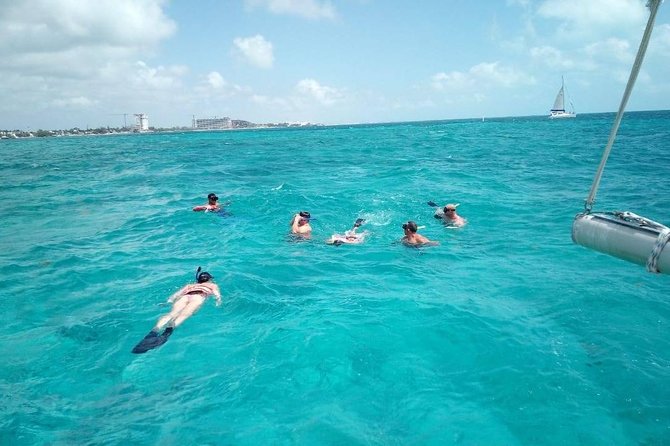 Isla Mujeres Premium Catamaran Tour with transportation from Playa del Carmen - Key Points