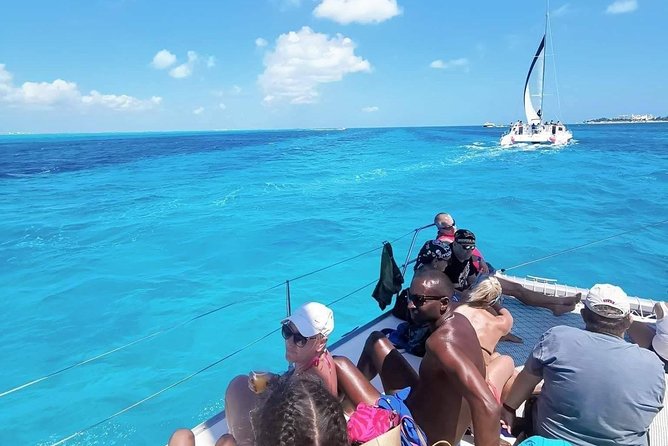 Isla Mujeres Premium Catamaran Tour with transportation from Playa del Carmen - Snorkeling at the Coral Reef and Underwater Statues