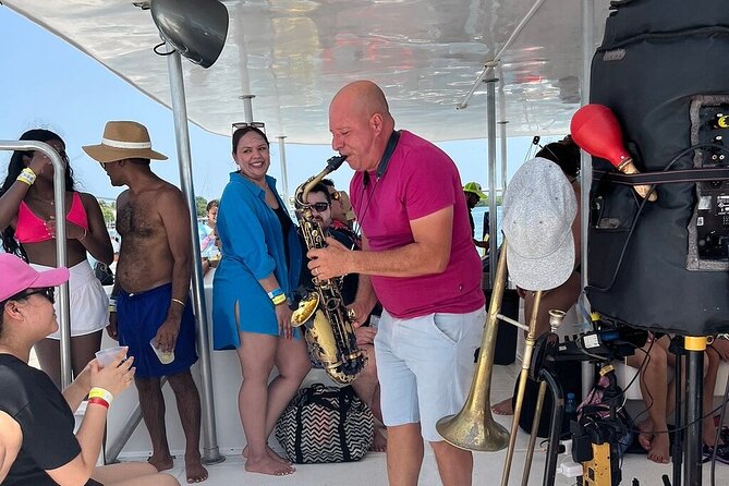 Isla Mujeres Private Catamaran Tour with Transportation - Beach Club Lunch and Relaxation on Isla Mujeres