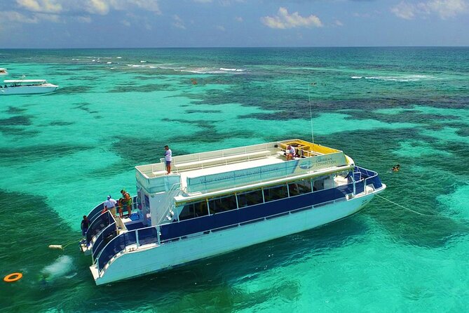 Isla Mujeres Private Catamaran Tour with Transportation - Return Journey: Sunset Cruise with Music and Drinks