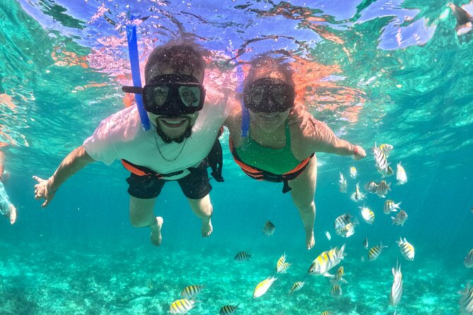 Isla Mujeres Spring Break Party Catamaran Snorkel and Open Bar - Gourmet Buffet Lunch at a Chic Beach Club