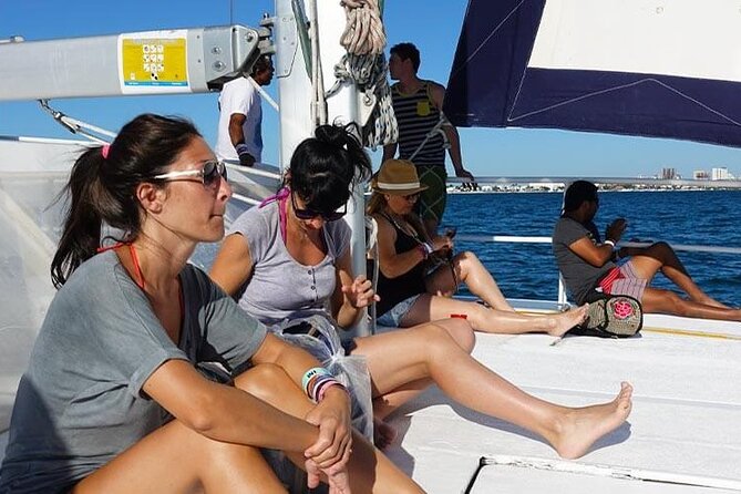 Isla Mujeres VIP Premium Catamaran Transport & Dock fee Included - The Beach Club Experience and Open Bar