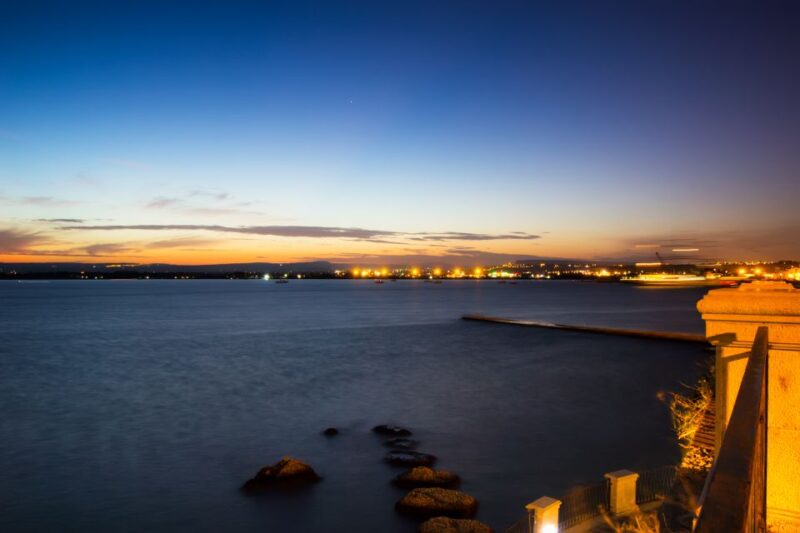 Island of Ortigia: Sunset Boat Tour with Aperitif - The Plemirio and Porto Grande Stops