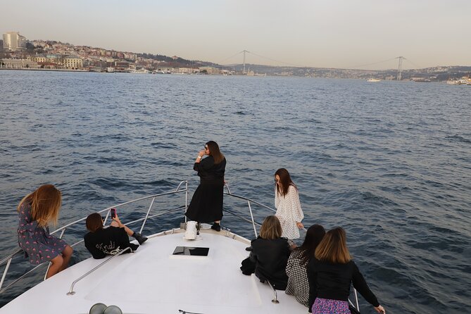 Istanbul Bosphorus Sunset Cruise on a Luxurious Yacht - Refreshments, Live Music, and the Evening Atmosphere