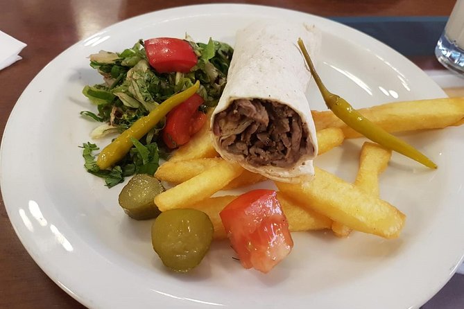 Istanbul Private Walking Food Tour With Secret Food Tours - Sipping Turkish Coffee and Wine at Viktor Levi Arap Evi