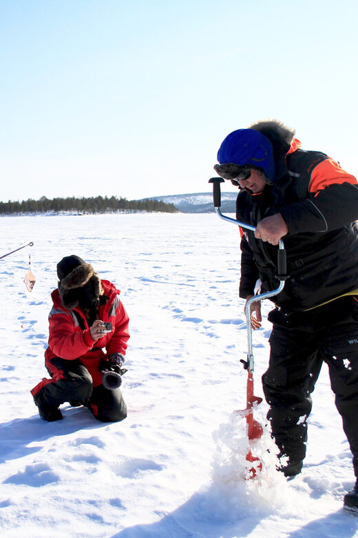 Ivalo: Ice Fishing Tour to Lake Inari, Reindeers & Lunch - Snowmobile and Sledge Ride through Arctic Scenery