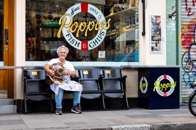 Jack the Ripper Tour with Fish & Chips Meal - Enjoying Fish & Chips at Poppies Restaurant