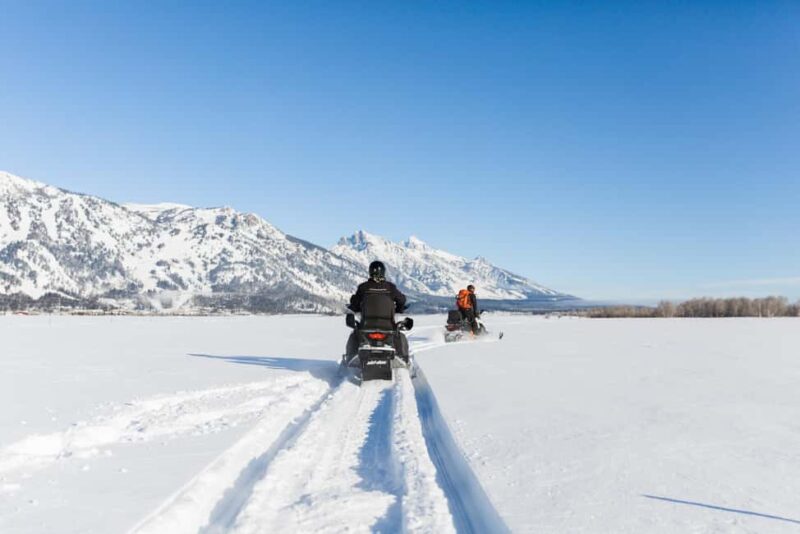 Jackson: Full-Day Snowmobile Rental with Gear & Trailer - Riding a 2025 Polaris or Ski-Doo Snowmobile