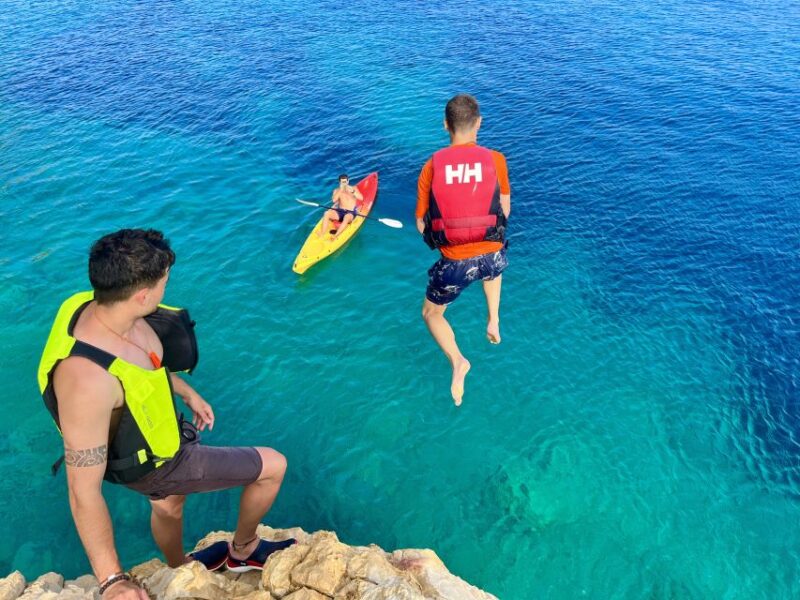 Jávea: Cala Tango and San Antonio Nature Reserve Kayak Tour - Cliff Jumping at Cala Tango: Adventure in a Stunning Setting