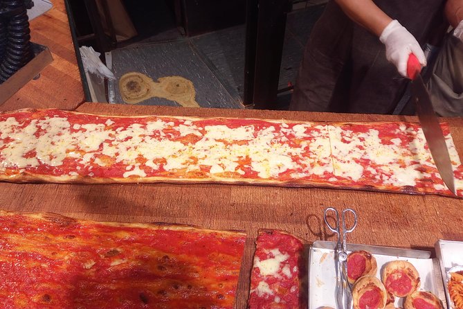 Jewish Ghetto and Campo Dè Fiori By Night Food, Wine and Sightseeing Tour - Final Stop: The Area Sacra di Largo Argentina