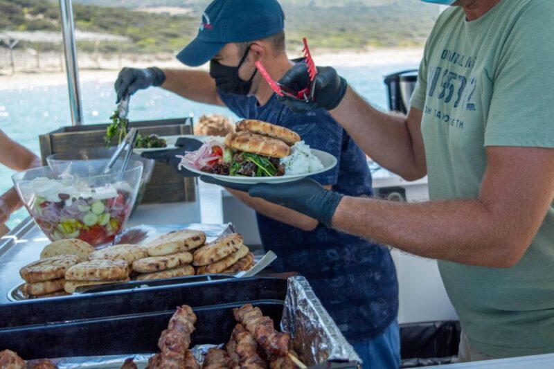 Kaiki cruise to Antiparos & Despotiko including BBQ lunch - Exploring Sea Caves and Coastal Formations