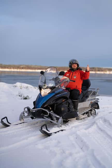 Kalix: Snowmobile Tour with Reindeer Feeding & Lunch - Meeting the Reindeer in the Forest