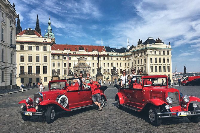 Karlstejn Castle in Vintage Convertible Car - Key Points