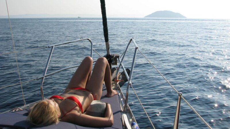 Kassandra: Sunset Sailing Boat Tour of Secluded Coves - Watching the Sunset Over the Aegean