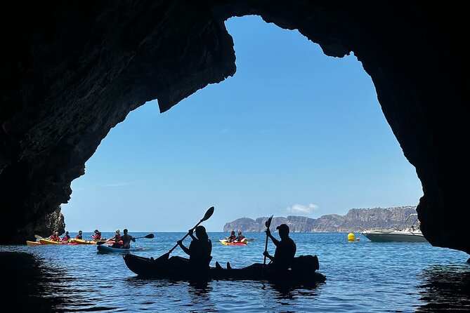 Kayak route through Cala Granadella - The Llop Marí Cave and Its Historical Charm