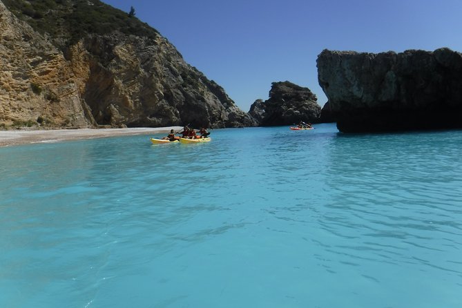 Kayak tour from Sesimbra to Ribeira do Cavalo Beach, passing through the caves - Cost-Effective Group Discounts and Booking Flexibility