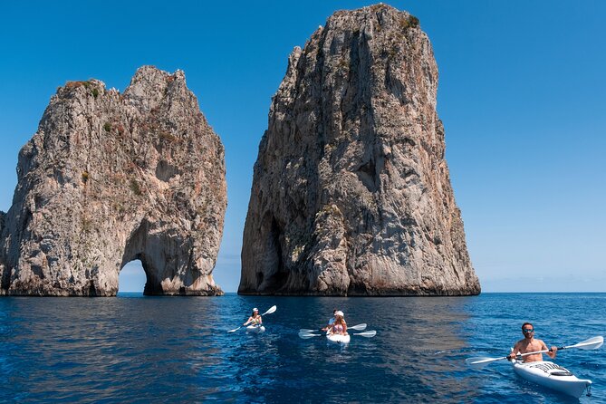 Kayak tour in Capri between caves and beaches. Photos included. - Swimming and Relaxing in Capri’s Clear Waters