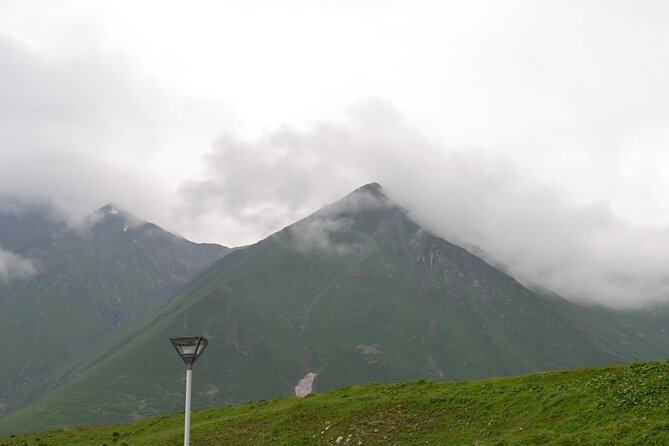 KAZBEGI GUDAURI ANANURI One day group tour From Tbilisi! - The Iconic Gergeti Trinity Church and Panoramic Views