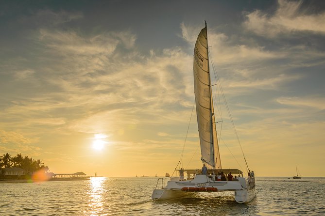 Key West Sunset Sail: Dolphin Watching, Wine, and Tapas - Weather Considerations and Dolphin Sightings