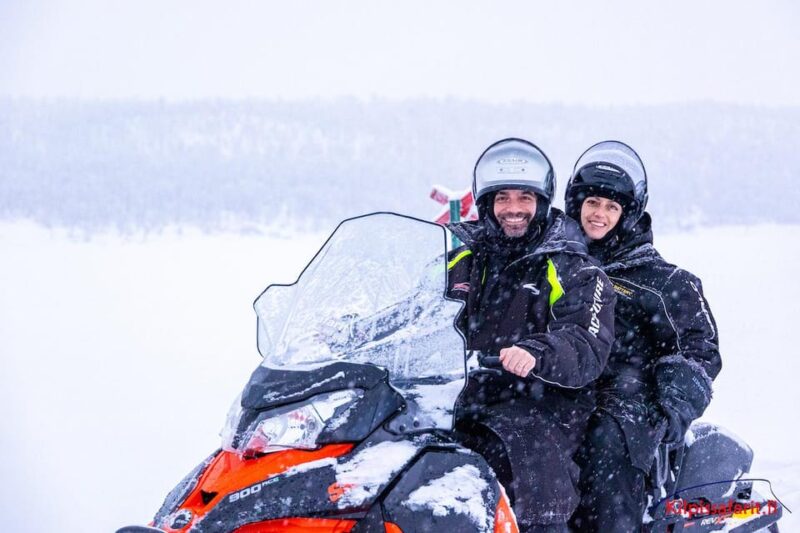 Kilpisjärvi: Border of Three Countries Snowmobile Safari - Exploring the Snowy Birch Forest