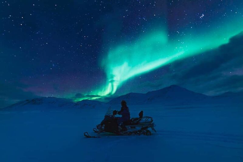 Kiruna: Northern Lights Snowmobile Tour - Scenic Trails Surrounded by Snow-Covered Forests