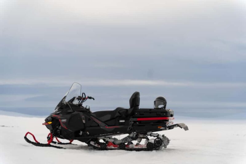 Kiruna: Small Group Snowmobile with Snacks - Scenic Breaks with Swedish Snacks and Hot Drinks