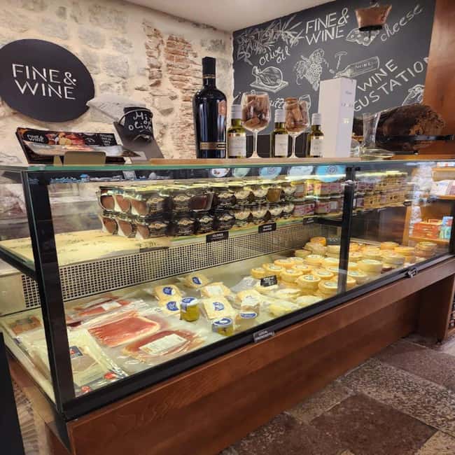 Kotor: Old Town Charms & 9 Local Tastings with Souvenirs - Tasting Local Olive Oil, Honey Brandy, and More at a Specialty Shop