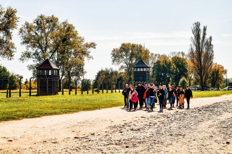 Krakow: Auschwitz-Birkenau Live Guided Tour & Hotel Pickup - Visiting Auschwitz I: The First Camp