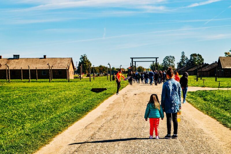 Krakow: Auschwitz-Birkenau Live Guided Tour & Hotel Pickup - Emotional and Educational Impact