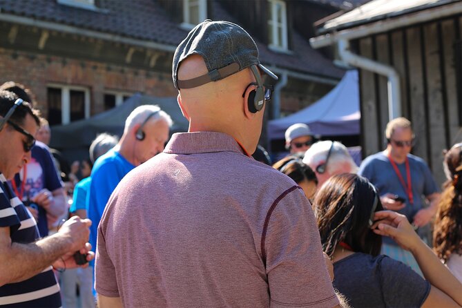 Krakow: Auschwitz Guided Tour Hotel Pickup & Lunch Option - Practical Details: Booking, Cancellation, and Group Size