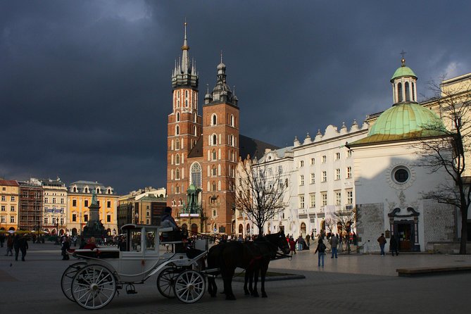 Krakow Old Town Highlights Private Walking Tour - Exploring Krakow’s Charming Streets and Unique Sculptures