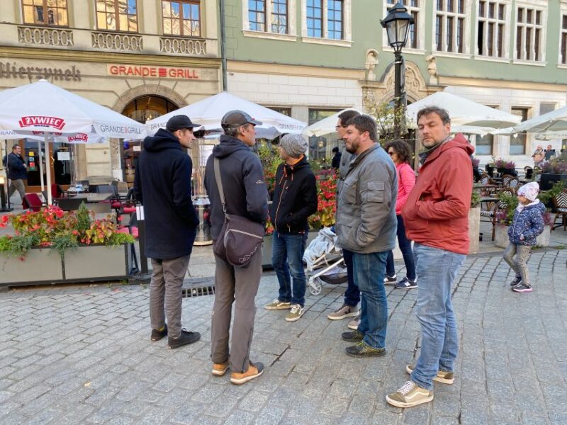 Krakow: Old Town Highlights Walking Tour - Walking Through Krakow’s Main Market Square