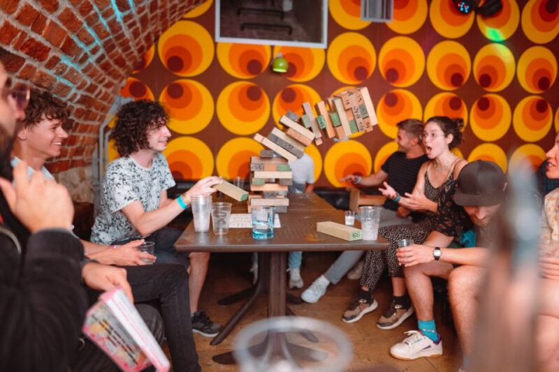 Krakow: Pub Crawl with 1 Hour of Unlimited Alcoholic Drinks - The Vibe and Crowd at Krakows Nightlife Spots