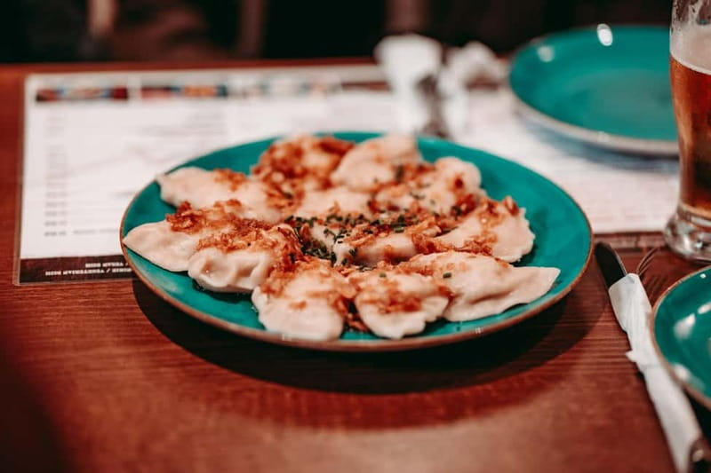 Krakow: Tipsy Polish Food Tour With History, Pierogi & Shots - Tasting Polish Drinks and Shots