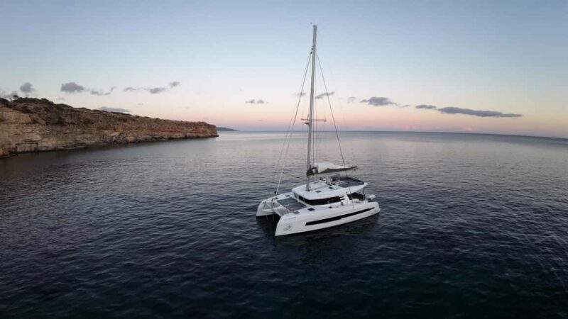 Lagos: Cliffs and Secret Caves in a Cervetti 44 Sail - Unparalleled Luxury Sailing Along the Algarve Coast