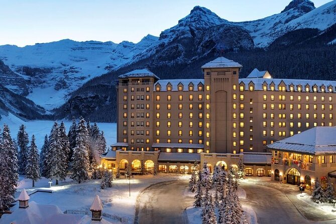 Lake Louise & Moraine Lake Tour from Calgary with Scenic Stops - Lake Minnewanka’s Expansive Blue Waters