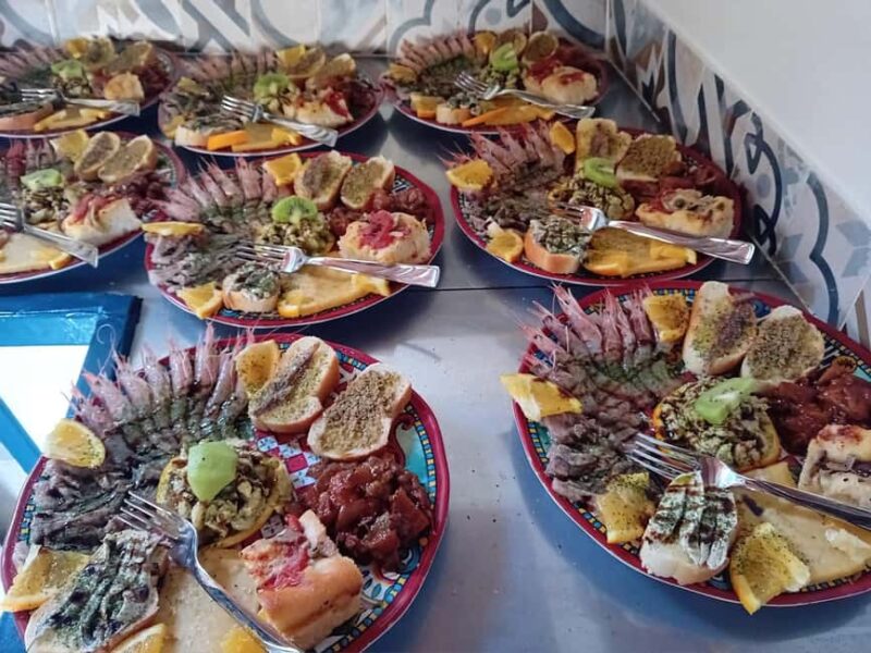 Lampedusa: Boat Cruise with Swimming Stops and Italian Lunch - Visiting the Saltwater Pool at Tabaccara