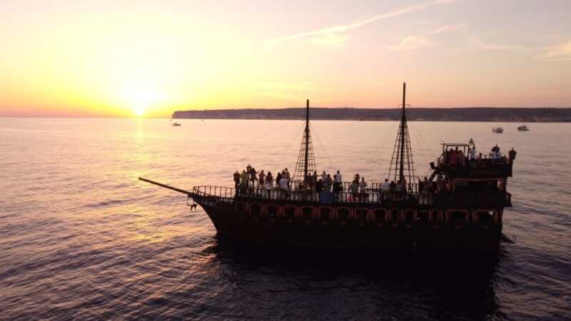 Lampedusa: Sunset Dolphin Sighting on a Pirate Ship - Night Swim and the Illuminated Sea Experience